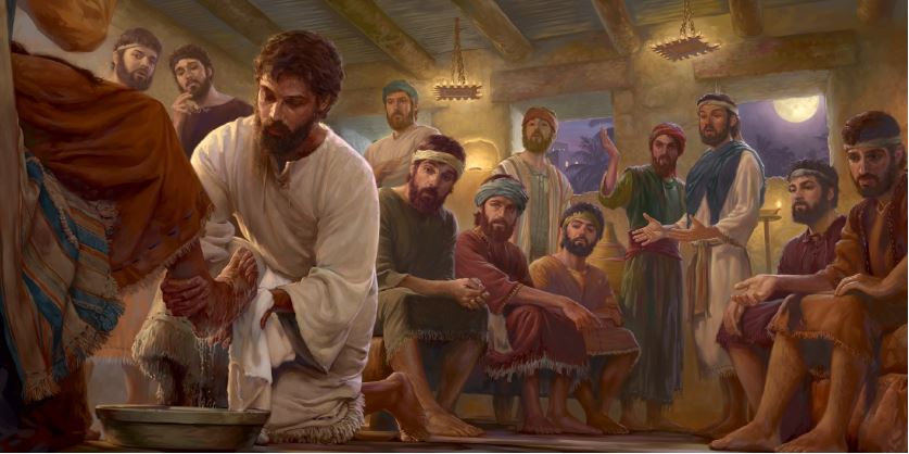 artwork of Jesus washing the feet of a disciple with the other disciples standing in the background looking distressed